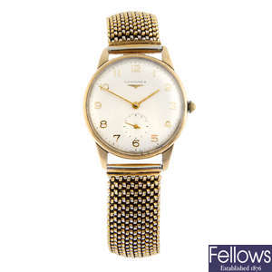LONGINES - a 9ct yellow gold bracelet watch, 33mm.