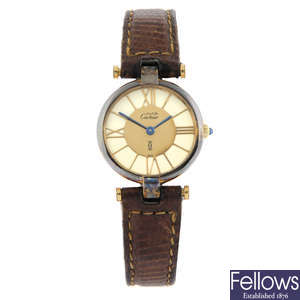CARTIER - a gold plated silver Must de Cartier wrist watch, 24mm.