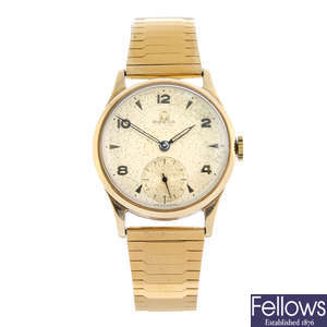 OMEGA - a 9ct yellow gold bracelet watch, 33mm.