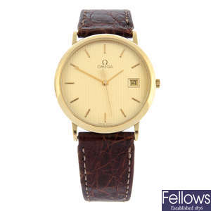 OMEGA - a gold plated De Ville wrist watch (32mm) with a gold plated Dunhill wrist watch.