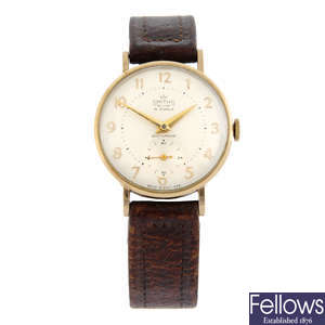 SMITHS - a 9ct yellow gold De Luxe wrist watch, 32mm.
