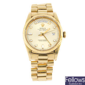 ROLEX - an 18ct gold Oyster Perpetual Day-Date bracelet watch, 36mm.