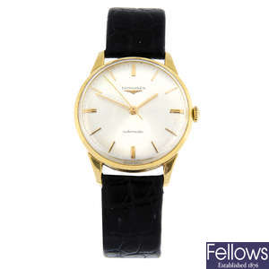 LONGINES - a yellow metal wrist watch, 34mm.
