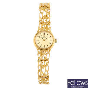 OMEGA - a 9ct yellow gold bracelet watch, 17mm.