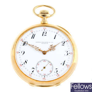 A yellow metal open face pocket watch by Patek Philippe, 48mm.