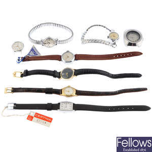 A group of eight assorted watches, to include five examples by Omega.