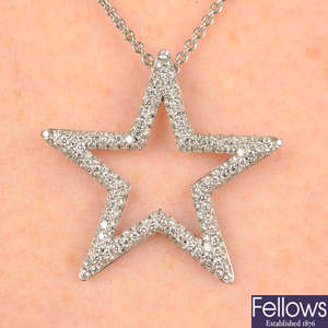 A pavé-set diamond star pendant, with 18ct gold chain, by Theo Fennell.