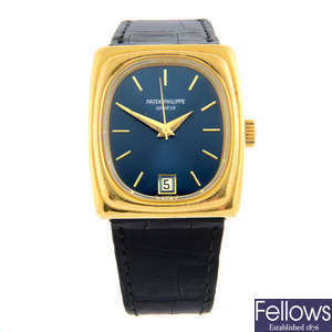 PATEK PHILIPPE - an 18ct yellow gold Beta 21 wrist watch, 33x37mm.