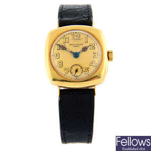 PATEK PHILLIPPE - a yellow metal Officer's wrist watch, 30x30mm.
