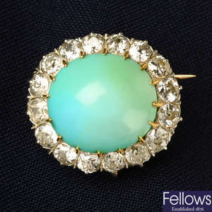 An early 20th century platinum and gold, turquoise and old-cut diamond cluster brooch.