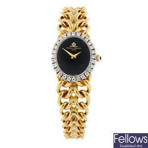 BAUME & MERCIER - a factory diamond set 18ct yellow gold bracelet watch, 22mm x 24mm.