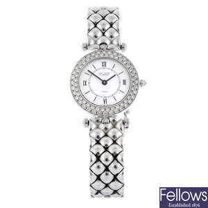 VAN CLEEF & ARPELS - a 18ct white gold Classique bracelet watch, 24mm.