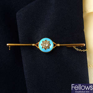 A late 19th century gold, floral vari-cut diamond and blue enamel bar brooch.