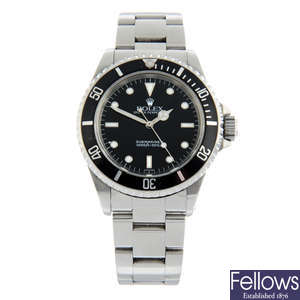 ROLEX - a stainless steel Oyster Perpetual Submariner bracelet watch, 39mm.