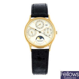 JAEGER-LECOULTRE - an 18ct yellow gold triple-calendar moonphase wrist watch, 33mm.