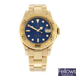 ROLEX - an 18ct yellow gold Oyster Perpetual Yacht-Master bracelet watch, 35mm.