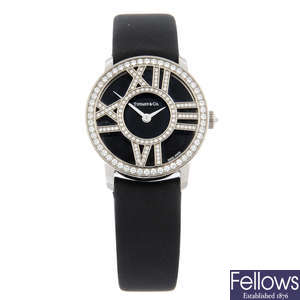 TIFFANY & CO. - a factory diamond set 18ct white gold Atlas wrist watch, 26mm.