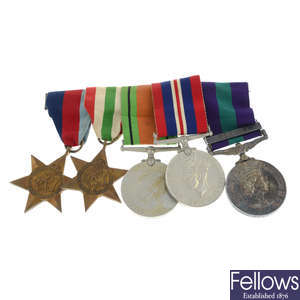 WWII, a group of four medals, mounted together with General Service Medal 1918-62. (5).