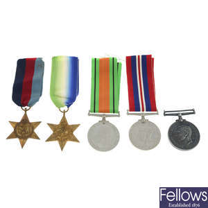 WWII group of four medals, together with a Royal Naval Long Service and Good Conduct Medal. (5).