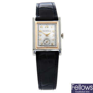 Patek Philippe - a wrist watch retailed by Gubelin, 26x26mm.