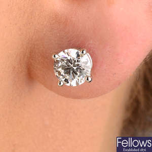 Diamond stud earrings, by Tiffany & Co.