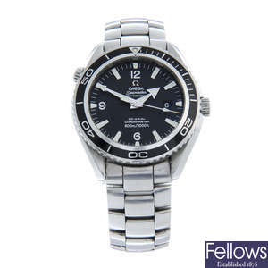 Omega - a SAS Seamaster Planet Ocean Co-Axial bracelet watch, 45mm.