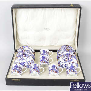 Cased Royal Worcester coffee cans