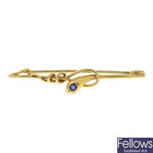 Victorian gold snake brooch, with sapphire crest