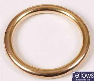 9ct gold slave bangle. Weight 17.52 grams.