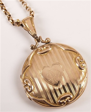 9ct gold back and front shaped circular locket