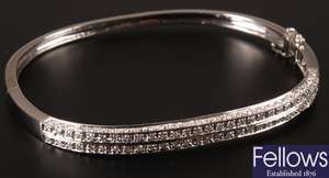 9ct white gold diamond set hinged bangle, with
