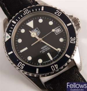 TAG HEUER - a gentleman's 1000 series with date