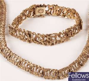 A matching 9ct gold necklet and bracelet set with