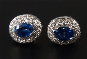 A pair of 18ct white gold oval sapphire and