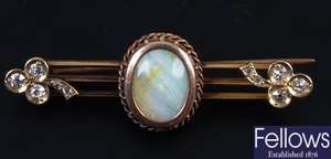 15ct gold bar brooch set a single opal and with