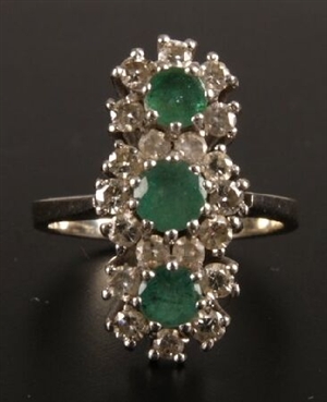 Diamond and emerald triple cluster up finger