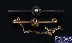Two diamond set bar brooches, to include a 15ct