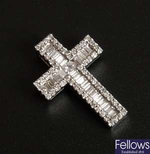 18ct white gold diamond set cross, a central