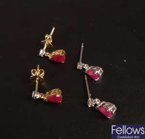 A pair of 18ct gold ruby dropper earrings with a