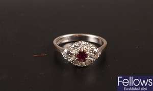 18ct white gold ruby and diamond oval cluster