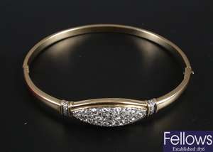 Hinged bangle with central diamond panel of