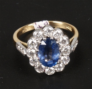 18ct gold oval sapphire and diamond cluster ring