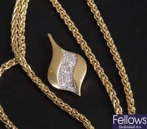 18ct gold fancy pendant with diamond set front
