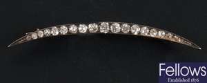 Diamond cresent brooch,  set with nineteen