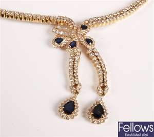 Two row diamond necklet with central sapphire and