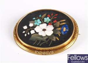 Pietra Dura oval brooch depicting floral spray,