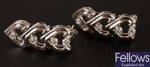 Diamond set dropper earrings, in the design of