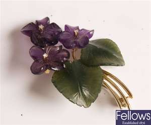 14ct gold floral design brooch, set amethyst