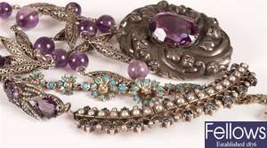 A crescent shape brooch set with sapphires and