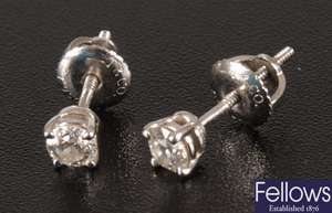 TIFFANY - a pair of 18ct white gold claw set